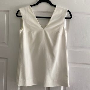 COS White structured sleeveless top.